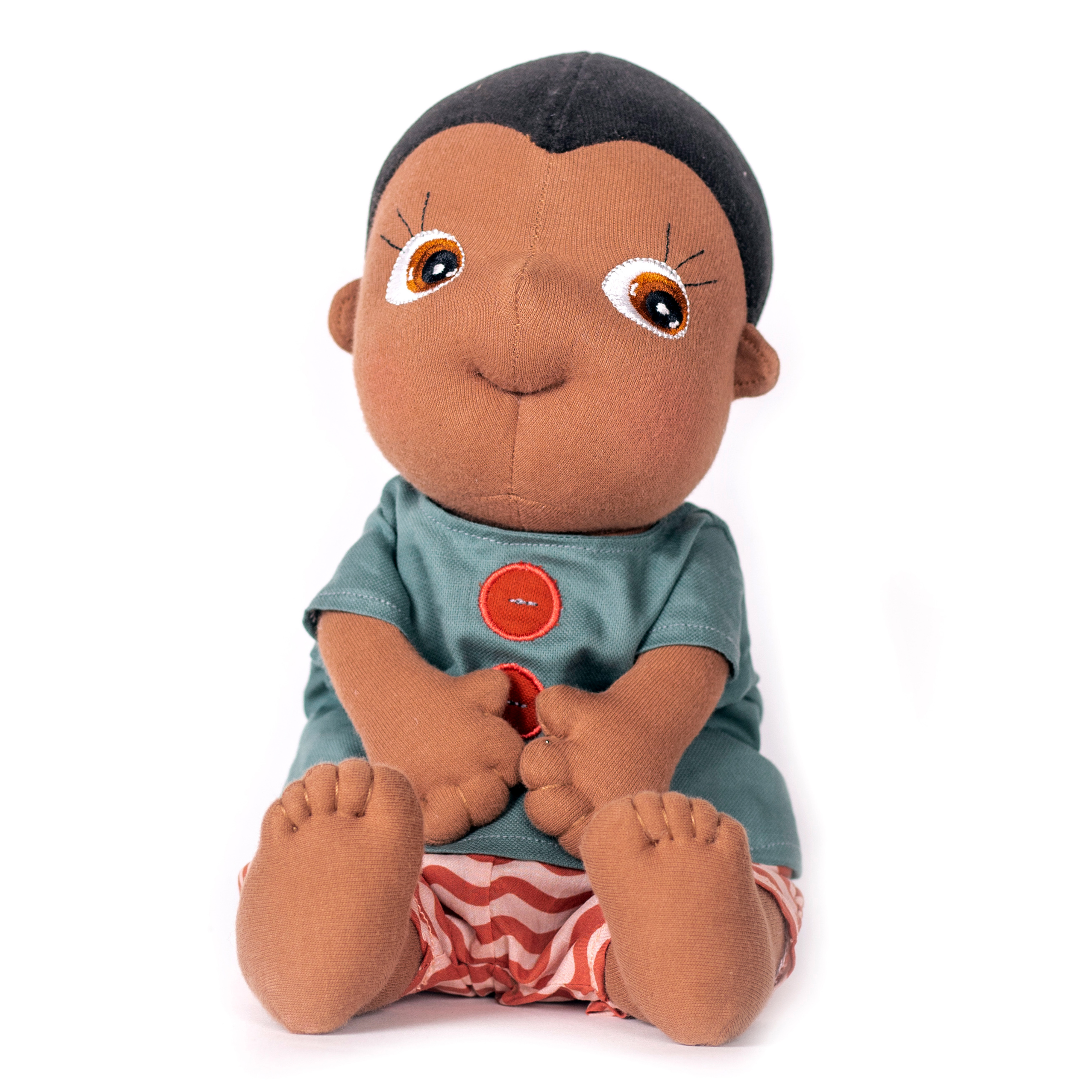 Rubens Tummies Puppe Kelvin mit petrolfarbenem Shirt und rot gestreifter Hose