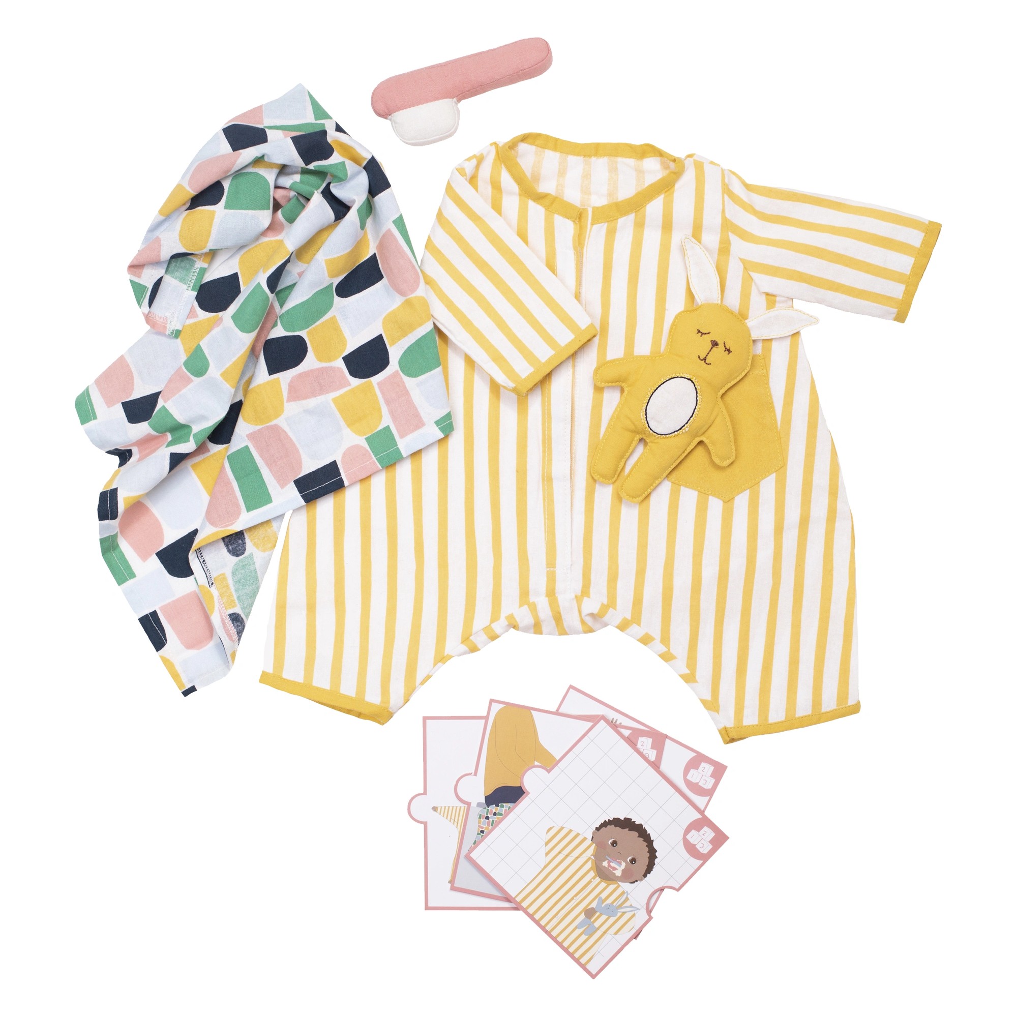 Schlaf-Set von Rubens Barn: gestreifter Schlafanzug, Kuschelhase, Decke, Zahnbürste und Bildkarten